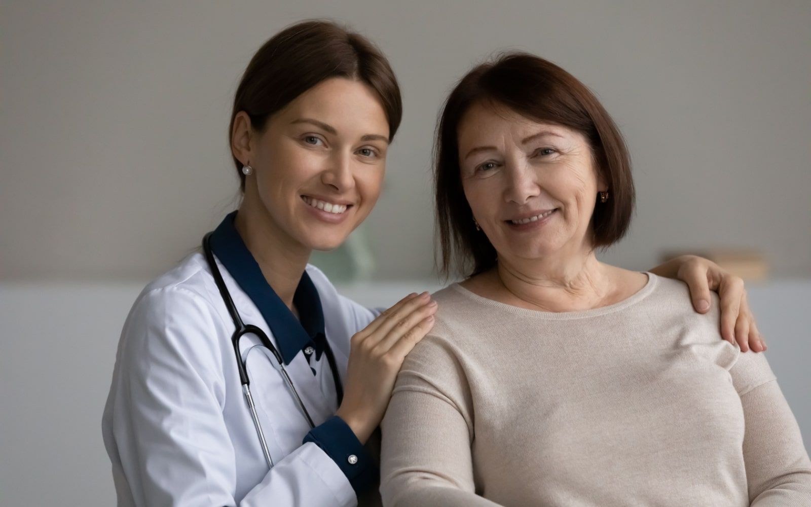 Doctor and Patient Posing For Picture