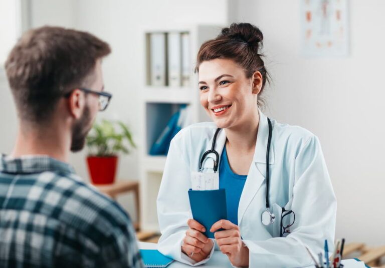 Woman Doctor prescribes medicine to young patient to treating his disease